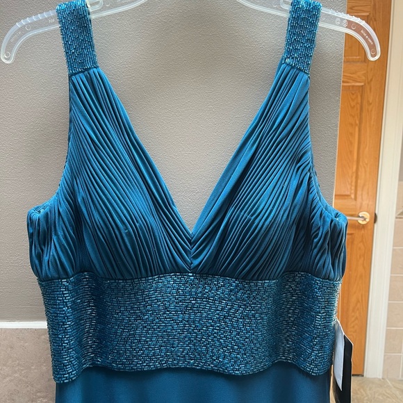 NWT deep turquoise blue formal beaded dress. Back zipper closure with hook. - Picture 2 of 7